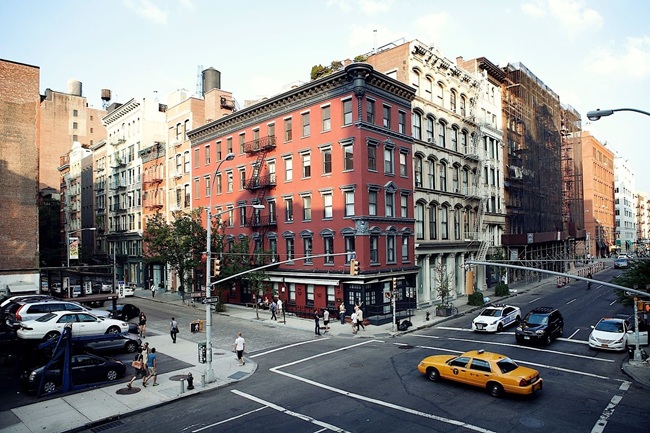 Cobblestone street with boutique shops in SoHo New York